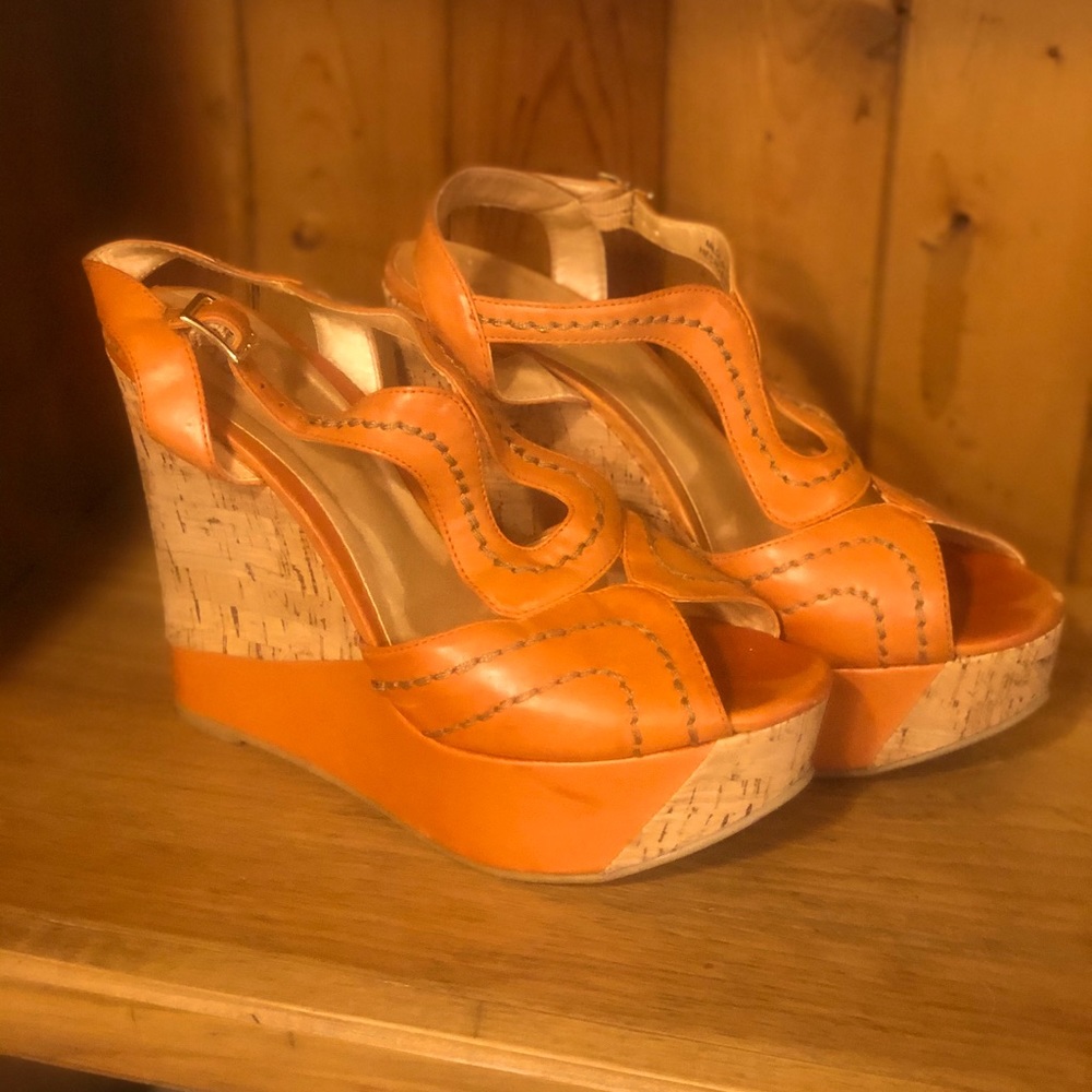 Orange wedge sandals with cork heel